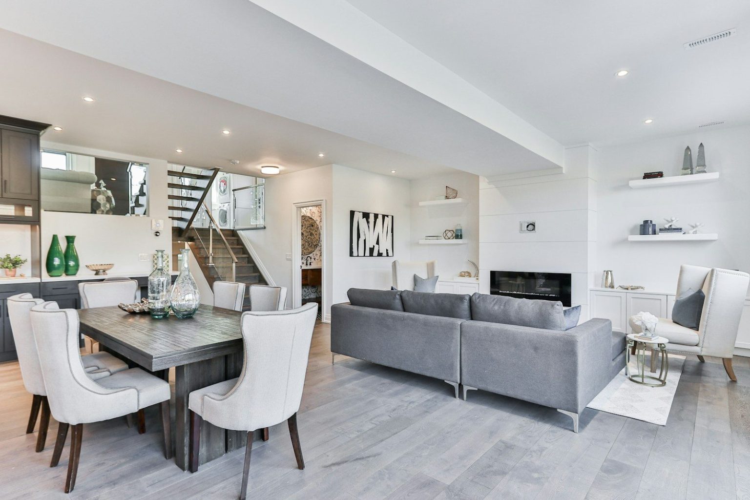 Photo by Lotus Design N Print black and white wooden table and chairs